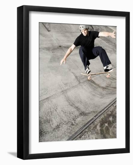 Skateboarder Performing Tricks-null-Framed Photographic Print