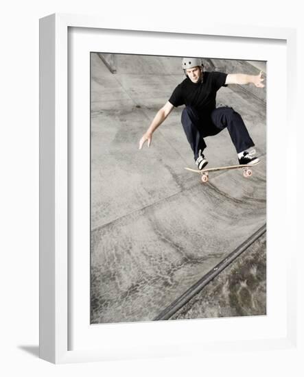 Skateboarder Performing Tricks-null-Framed Photographic Print