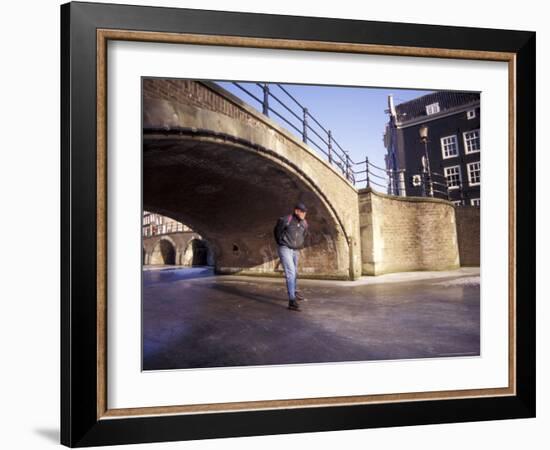 Skater on Frozen Canal, Amsterdam, Netherlands-Michele Molinari-Framed Photographic Print