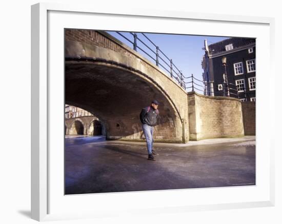 Skater on Frozen Canal, Amsterdam, Netherlands-Michele Molinari-Framed Photographic Print