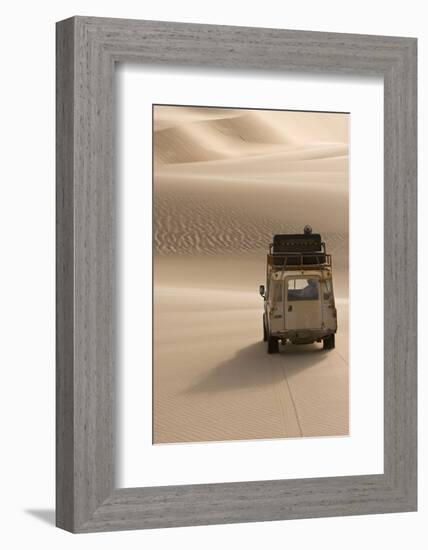 Skeleton Coast, Namibia. Land Rover Venturing Out over the Sand Dunes-Janet Muir-Framed Photographic Print