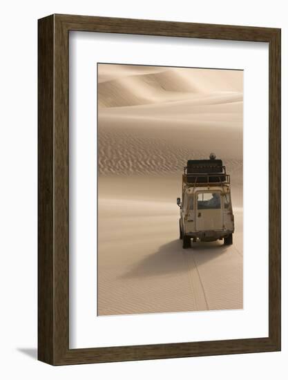 Skeleton Coast, Namibia. Land Rover Venturing Out over the Sand Dunes-Janet Muir-Framed Photographic Print