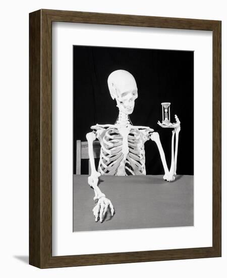 Skeleton Holding Hourglass-Bettmann-Framed Photographic Print