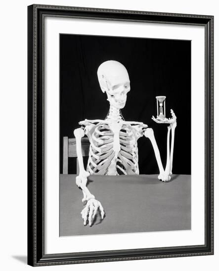 Skeleton Holding Hourglass-Bettmann-Framed Photographic Print