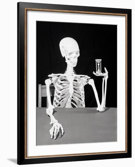 Skeleton Holding Hourglass-Bettmann-Framed Photographic Print