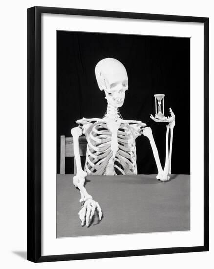 Skeleton Holding Hourglass-Bettmann-Framed Photographic Print