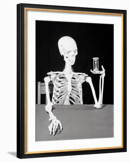 Skeleton Holding Hourglass-Bettmann-Framed Photographic Print