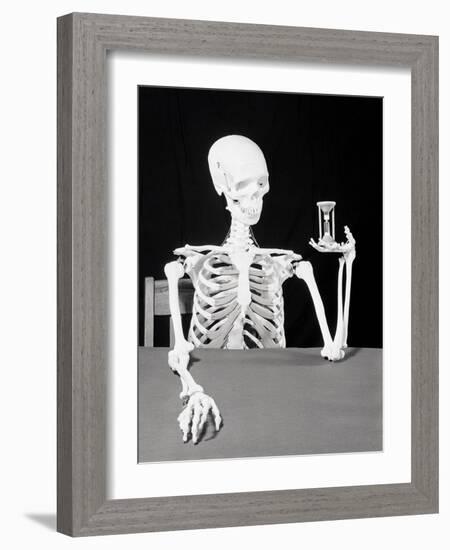 Skeleton Holding Hourglass-Bettmann-Framed Photographic Print