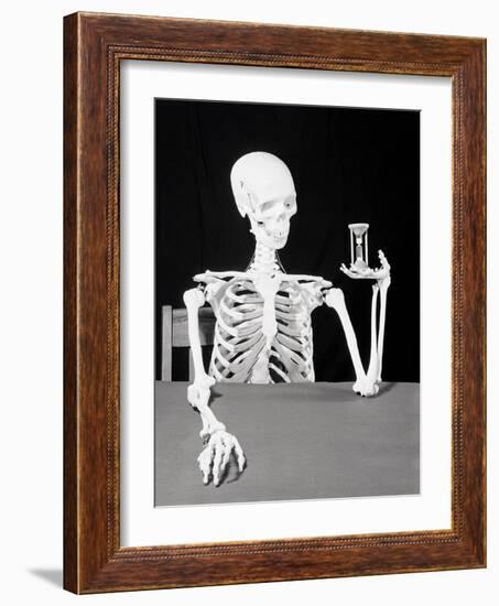 Skeleton Holding Hourglass-Bettmann-Framed Photographic Print