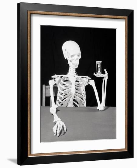 Skeleton Holding Hourglass-Bettmann-Framed Photographic Print