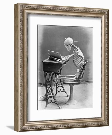 Skeleton Reading at Desk-Bettmann-Framed Photographic Print