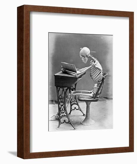 Skeleton Reading at Desk-Bettmann-Framed Photographic Print