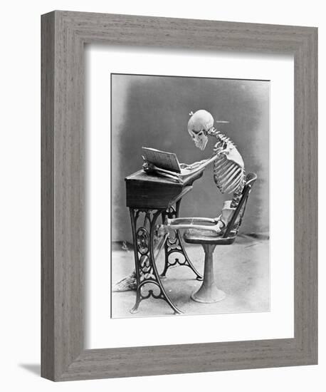 Skeleton Reading at Desk-Bettmann-Framed Photographic Print