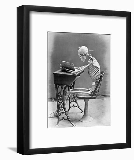 Skeleton Reading at Desk-Bettmann-Framed Photographic Print