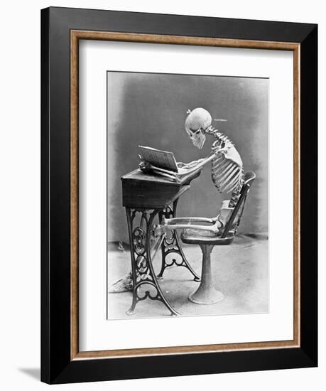 Skeleton Reading at Desk-Bettmann-Framed Photographic Print