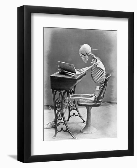 Skeleton Reading at Desk-Bettmann-Framed Photographic Print