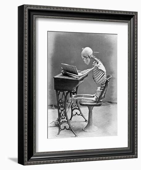 Skeleton Reading at Desk-Bettmann-Framed Photographic Print