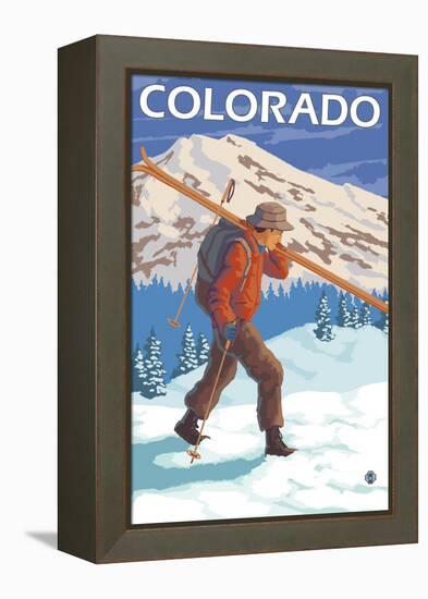 Skier Carrying Skis - Colorado-Lantern Press-Framed Stretched Canvas