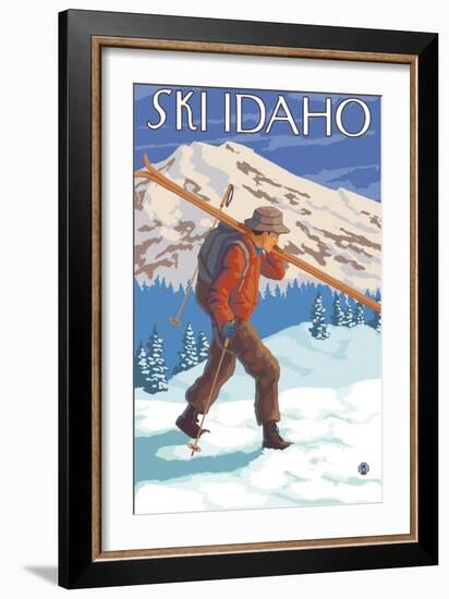 Skier Carrying Snow Skis, Idaho-Lantern Press-Framed Art Print