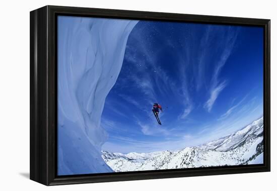 Skier Jumping from Mountain Ledge-null-Framed Stretched Canvas