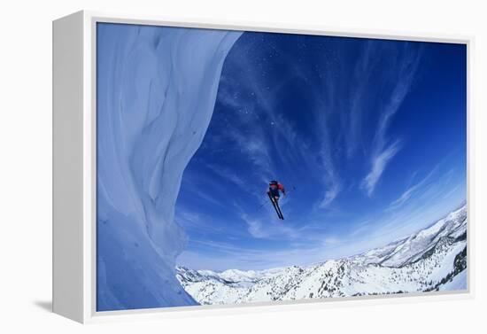 Skier Jumping from Mountain Ledge-null-Framed Stretched Canvas