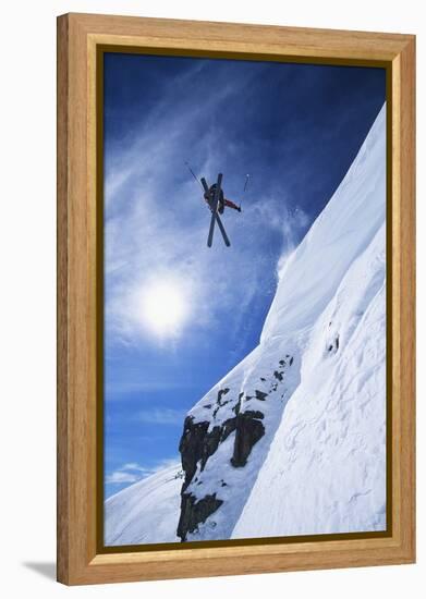 Skier Jumping from Mountain Ledge-null-Framed Stretched Canvas