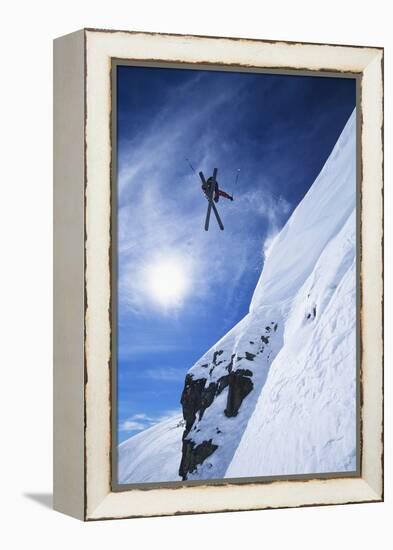 Skier Jumping from Mountain Ledge-null-Framed Stretched Canvas