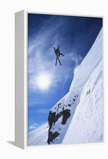 Skier Jumping from Mountain Ledge-null-Framed Stretched Canvas