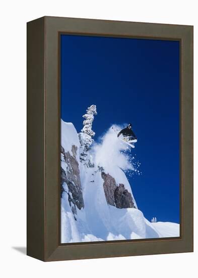 Skier Jumping from Mountain Ledge-null-Framed Stretched Canvas