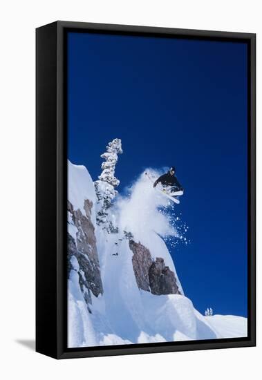 Skier Jumping from Mountain Ledge-null-Framed Stretched Canvas