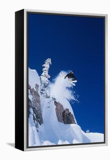 Skier Jumping from Mountain Ledge-null-Framed Stretched Canvas