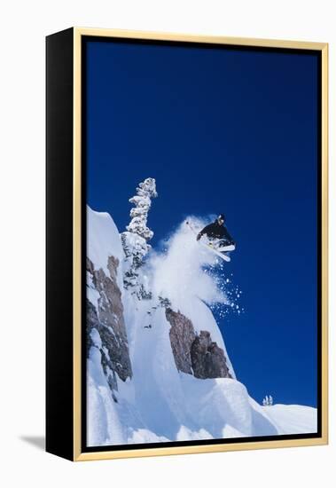 Skier Jumping from Mountain Ledge-null-Framed Stretched Canvas