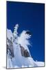 Skier Jumping from Mountain Ledge-null-Mounted Photo