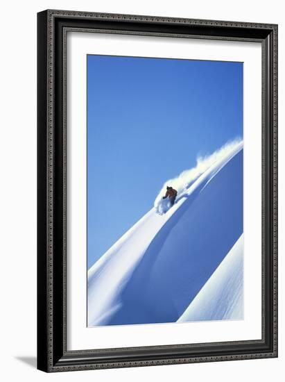 Skier Racing Down Mountain Slope-null-Framed Photo