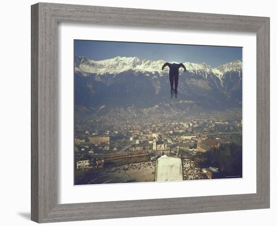 Skier Taking Off from the Bergisel Jump Hangs During Innsbruck Winter Olympics Competition-Ralph Crane-Framed Photographic Print