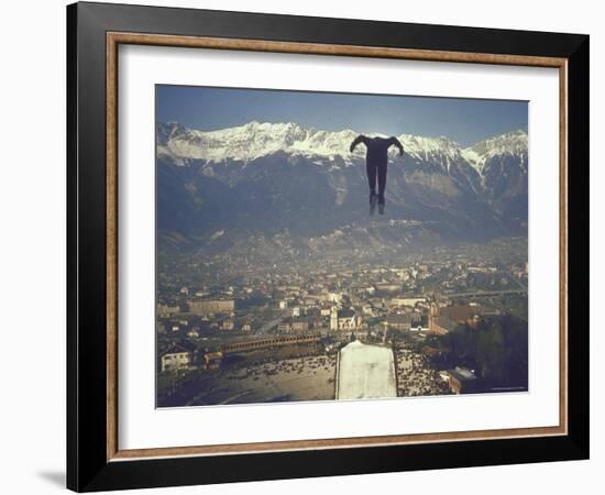 Skier Taking Off from the Bergisel Jump Hangs During Innsbruck Winter Olympics Competition-Ralph Crane-Framed Photographic Print