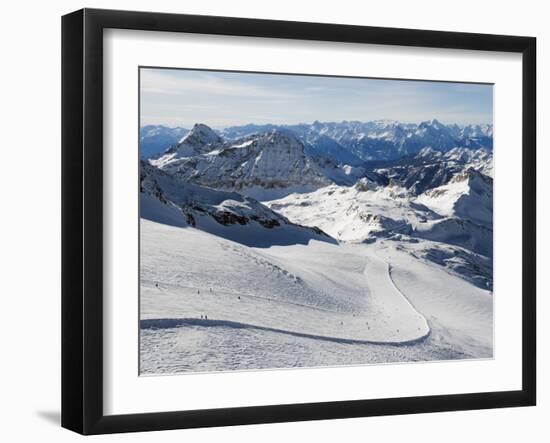 Skiers, Mountain Scenery in Cervinia Ski Resort, Cervinia, Valle D'Aosta, Italian Alps, Italy-Christian Kober-Framed Photographic Print