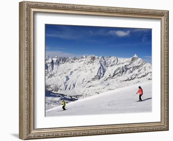 Skiers, Mountain Scenery in Cervinia Ski Resort, Cervinia, Valle D'Aosta, Italian Alps, Italy-Christian Kober-Framed Photographic Print