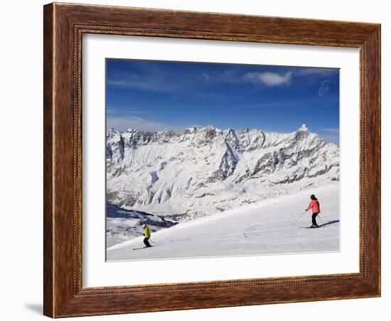 Skiers, Mountain Scenery in Cervinia Ski Resort, Cervinia, Valle D'Aosta, Italian Alps, Italy-Christian Kober-Framed Photographic Print