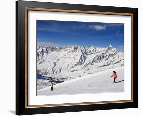 Skiers, Mountain Scenery in Cervinia Ski Resort, Cervinia, Valle D'Aosta, Italian Alps, Italy-Christian Kober-Framed Photographic Print