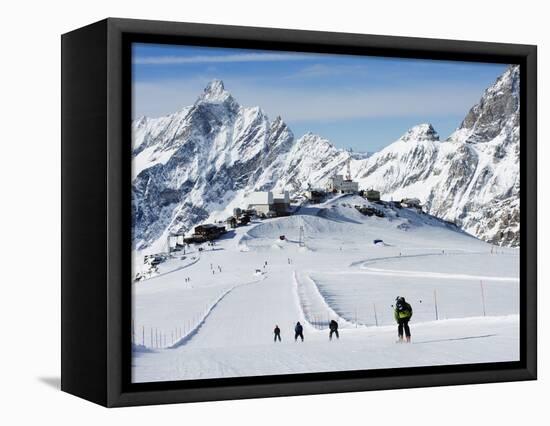 Skiers, Mountain Scenery in Cervinia Ski Resort, Cervinia, Valle D'Aosta, Italian Alps, Italy-Christian Kober-Framed Premier Image Canvas