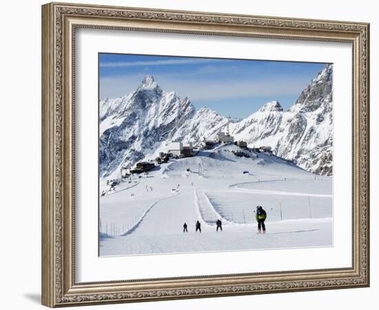 Skiers, Mountain Scenery in Cervinia Ski Resort, Cervinia, Valle D'Aosta, Italian Alps, Italy-Christian Kober-Framed Photographic Print