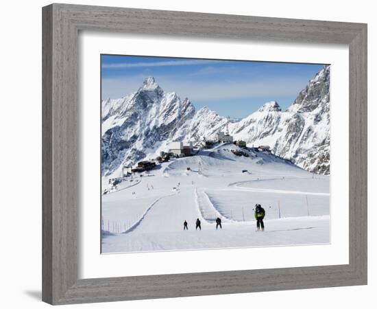 Skiers, Mountain Scenery in Cervinia Ski Resort, Cervinia, Valle D'Aosta, Italian Alps, Italy-Christian Kober-Framed Photographic Print