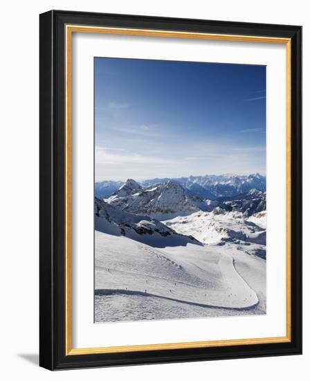 Skiers, Mountain Scenery in Cervinia Ski Resort, Cervinia, Valle D'Aosta, Italian Alps, Italy-Christian Kober-Framed Photographic Print