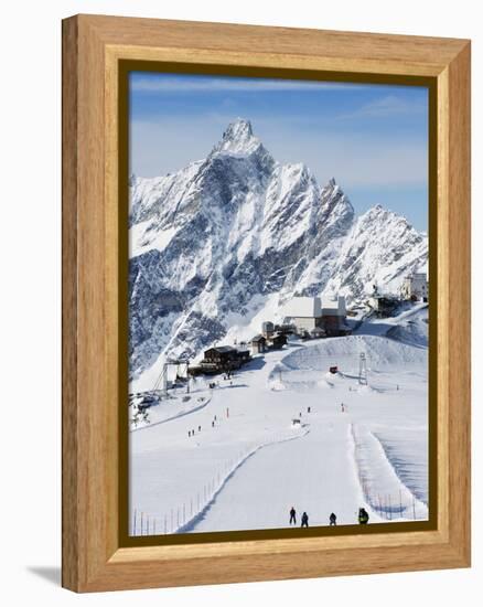 Skiers, Mountain Scenery in Cervinia Ski Resort, Cervinia, Valle D'Aosta, Italian Alps, Italy-Christian Kober-Framed Premier Image Canvas