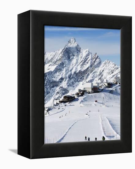 Skiers, Mountain Scenery in Cervinia Ski Resort, Cervinia, Valle D'Aosta, Italian Alps, Italy-Christian Kober-Framed Premier Image Canvas