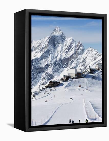 Skiers, Mountain Scenery in Cervinia Ski Resort, Cervinia, Valle D'Aosta, Italian Alps, Italy-Christian Kober-Framed Premier Image Canvas