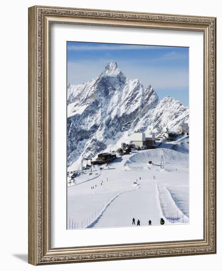 Skiers, Mountain Scenery in Cervinia Ski Resort, Cervinia, Valle D'Aosta, Italian Alps, Italy-Christian Kober-Framed Photographic Print