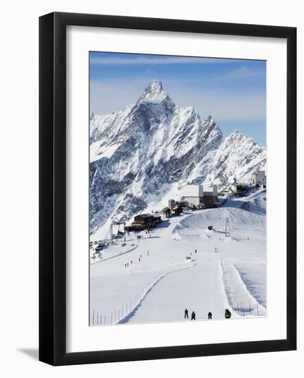 Skiers, Mountain Scenery in Cervinia Ski Resort, Cervinia, Valle D'Aosta, Italian Alps, Italy-Christian Kober-Framed Photographic Print