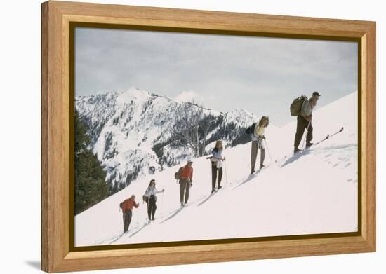 Skiers on the Slopes of Sun Valley Ski Resort, Idaho, April 22, 1947-George Silk-Framed Premier Image Canvas